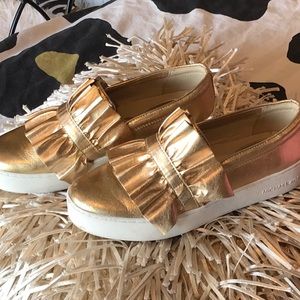 Shiny gold patent, new slip on Michael Kors